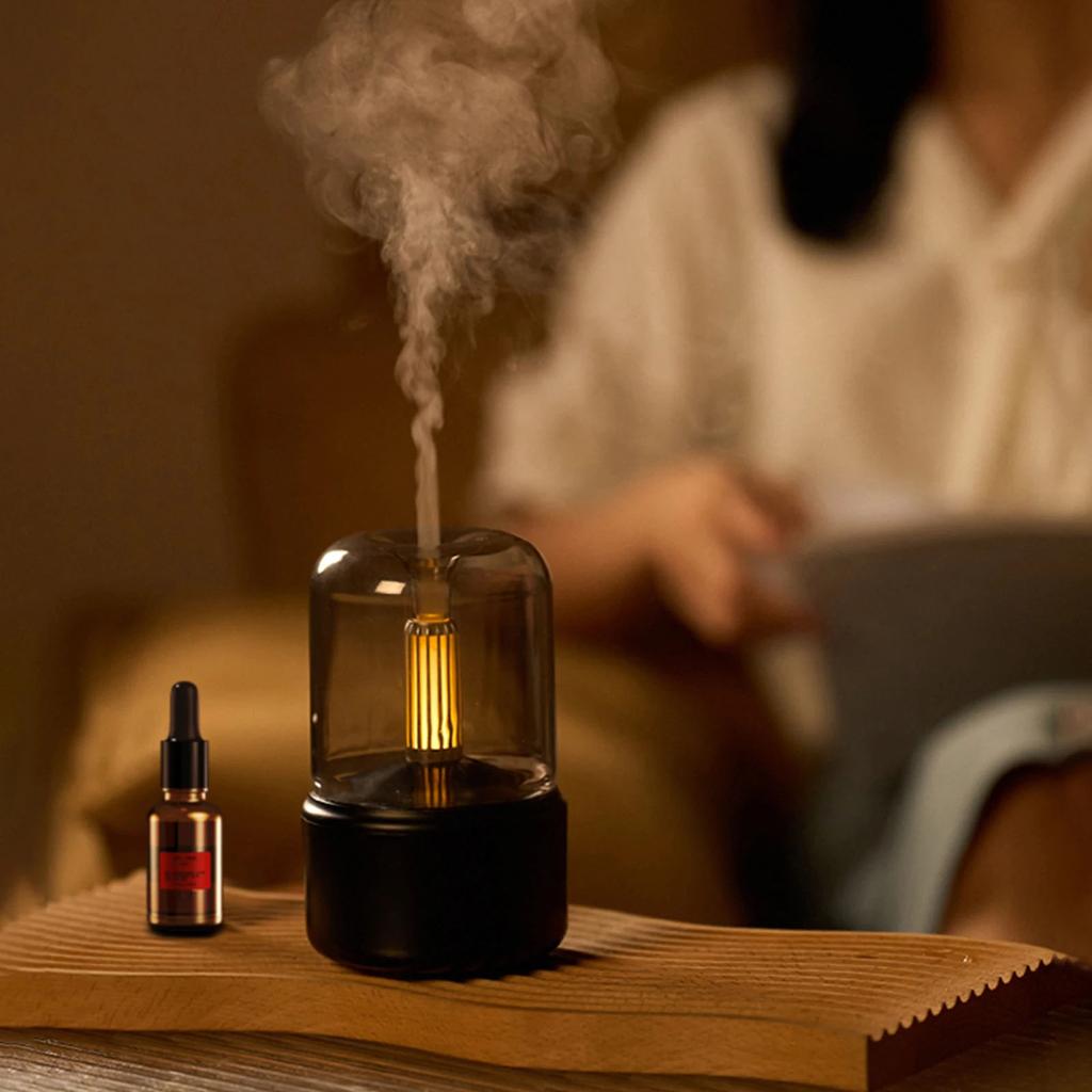 Electric aroma diffuser with USB charging port and LED lighting
